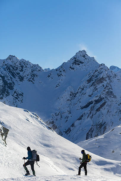 istock Hikers with snowshoes 531226551
