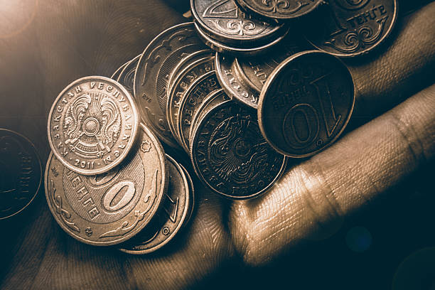 istock Coins tenge in hand 531226861
