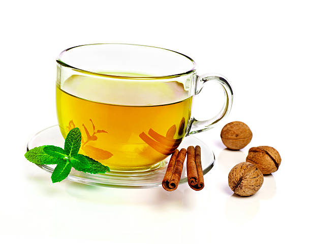istock Cup of tea with cinnamon and nuts 531228251