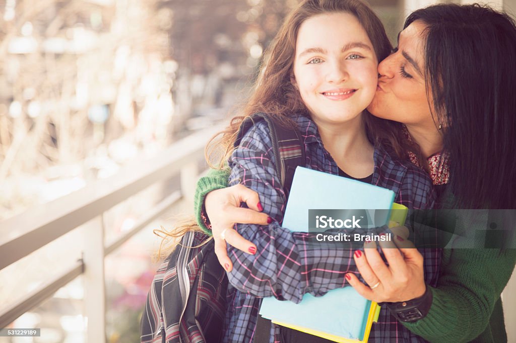 Happy Mother and Daughter with Books Happy Mother and Daughter with Books  Back to School Stock Photo