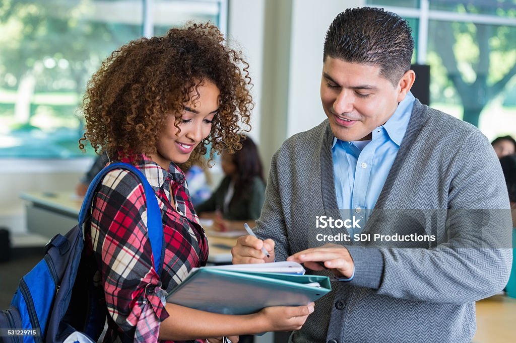 Paper Explaining Homework Teacher Explaining Homework Assignment To Cute High School Student ...