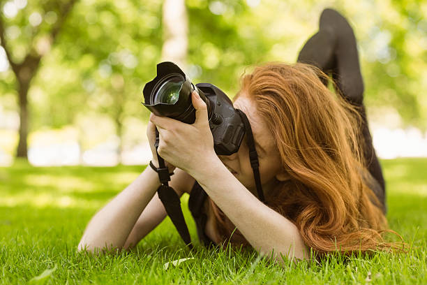istock Female photographer at the park 531236781