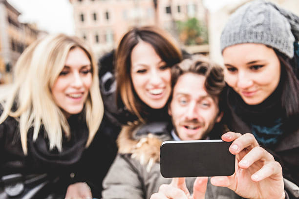 istock Group of happy friends taking a selfie 531237333