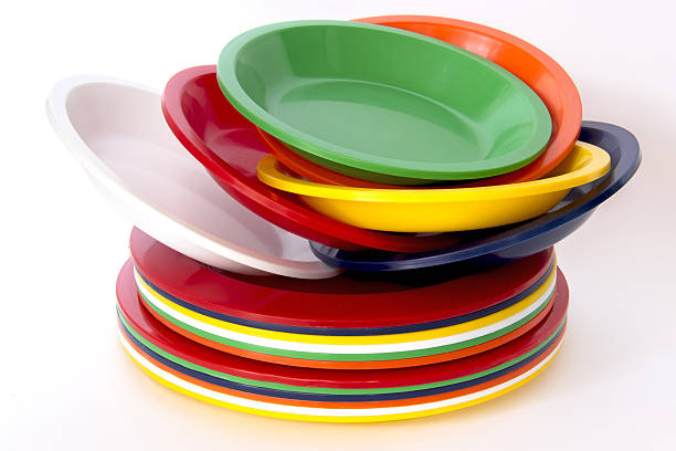 istock Stacked colorful plastic plates isolated on white background 531238035