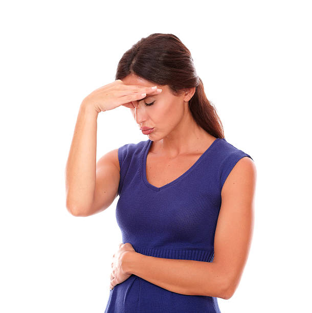 istock Lovely female with hand on head and closed eyes 531240229