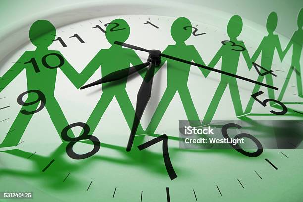 Clock And Paper Dolls Stock Photo - Download Image Now - 2015, Accuracy, Checking the Time