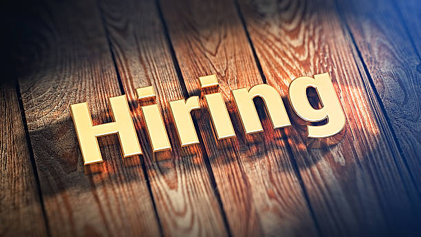istock Word Hiring on wood planks 531240608
