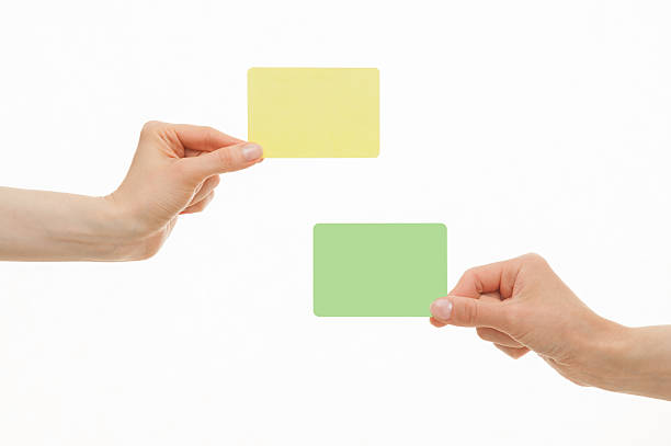istock Human hands holding colorful paper cards 531241076