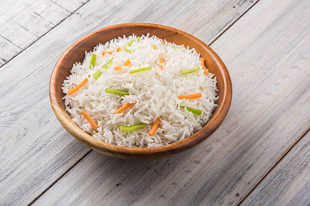 istock cooked white basmati rice with carrot and capsicum toppings 531242368