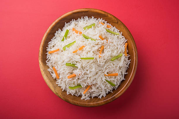 istock cooked white basmati rice with carrot and capsicum toppings 531243202