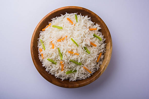 istock cooked white basmati rice with carrot and capsicum toppings 531244066