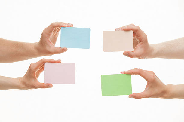 istock Human hands holding colorful paper cards 531244878