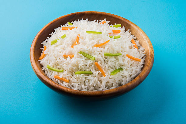 istock cooked white basmati rice with carrot and capsicum toppings 531245288