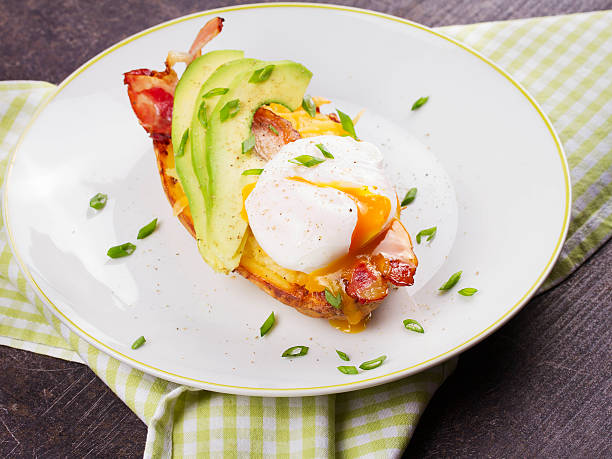 istock Stuffed potato with bacon, poached egg and avocado 531247440