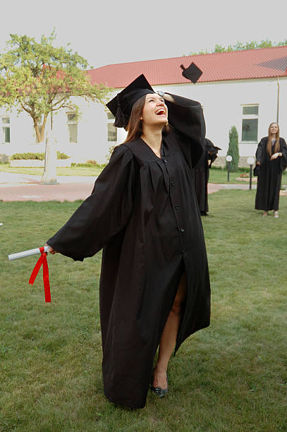 istock Happy graduate in the mantle looks up 531247822