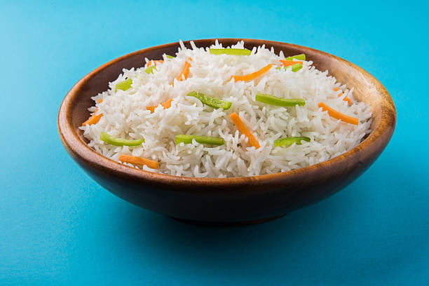 istock cooked white basmati rice with carrot and capsicum toppings 531248550