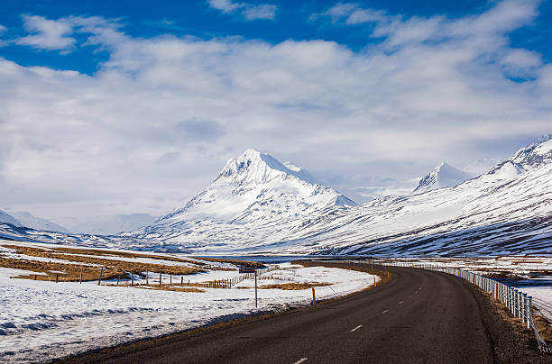 istock highway and snow mountain in Iceland 531249121