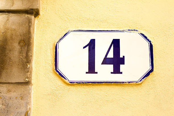 istock Number 14 Street Address Tile On Old Yellow Wall 531249782