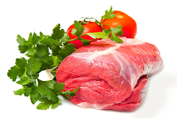 istock Piece of raw beef with parsley 531250000