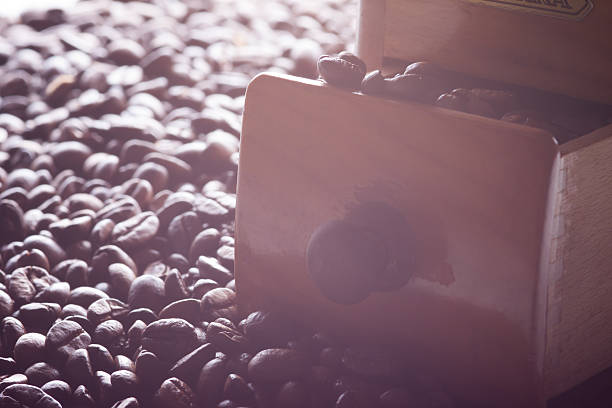 grinder and coffee beans stock photo