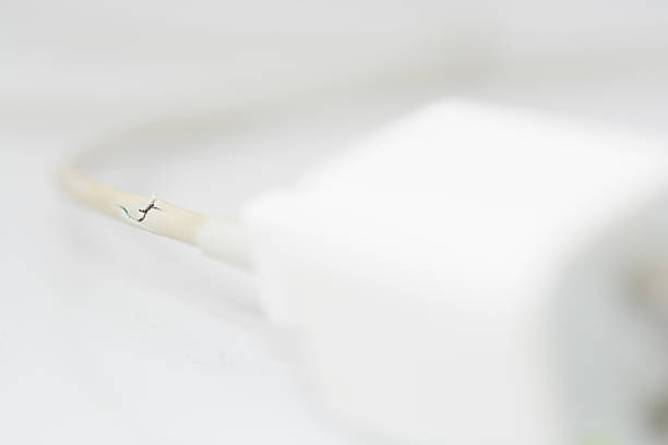 istock Closeup the Broken Charger Cable on white background 531251070