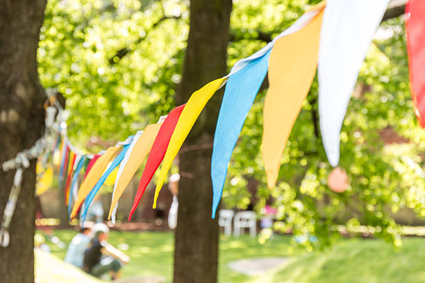 istock Chain of colored flags on the lawn 531252418
