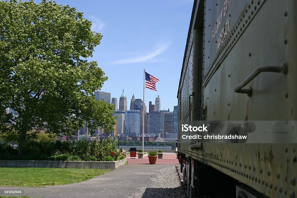 Skyline and Flag A view of lower Manhattan from Liberty Park, NJ 2015 Stock Photo