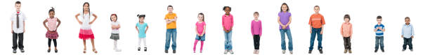 Kids A diverse group of kids kids in a different dress stock pictures, royalty-free photos & images