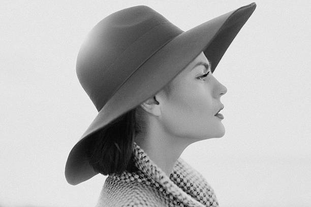 istock Beautiful girl with make-up, dressed in old-fashioned coat and hat 531252643