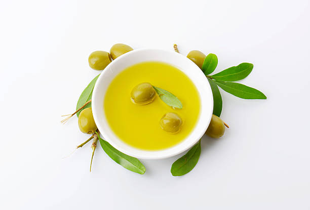 istock Pitted green olives and oil 531252779