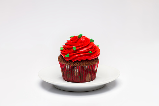 Cupcake. The concept of Christmas baking. Confection on a light background