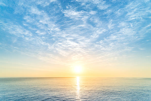 Sunrise Sunrise in ocean horizon over water photos stock pictures, royalty-free photos & images