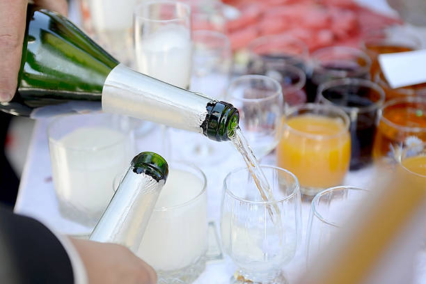 istock Cheers! two opened bottle of champagne on a holiday table 531253867