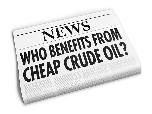 istock Newspaper with Who benefits from cheap oil? headline 531254095