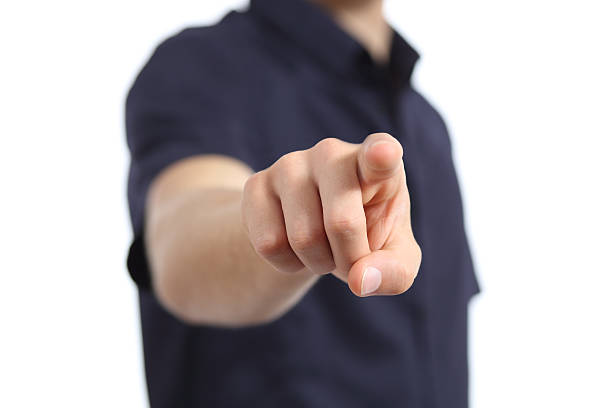 close up of a man hand pointing at camera - wijsvinger stockfoto's en -beelden