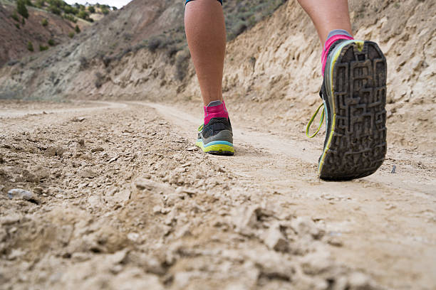 istock Woman Running on Dirt Road 531257132