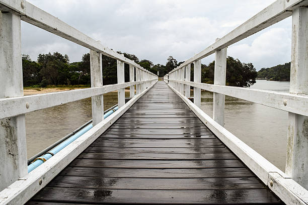 istock Pedestrian bridge crossing on an overcast and drizzly day 531258038