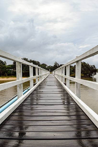 istock Pedestrian bridge crossing on an overcast and drizzly day 531258590