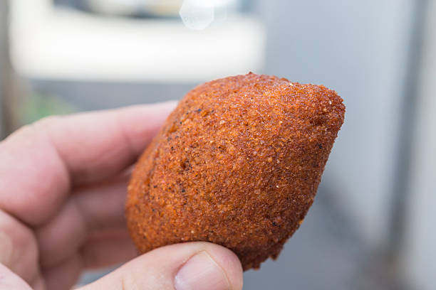 Kibbeh - Middle Eastern meal in hand