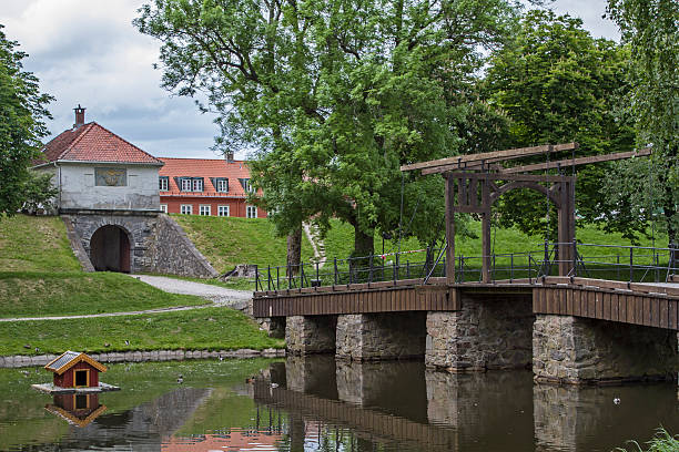 Drawbridge over the moat Fredrikstad is located in the extreme south-east of Norway, and is the best preserved fortress town in Scandinavia drawbridge photos stock pictures, royalty-free photos & images
