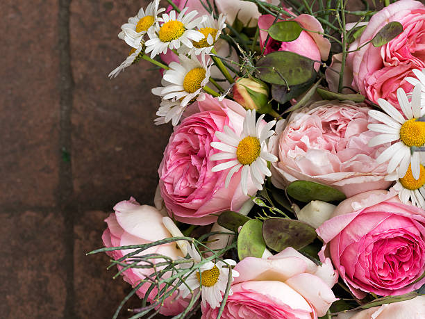 istock Rustic pink bouquet - garden flowers, arranged in tin. 531260476