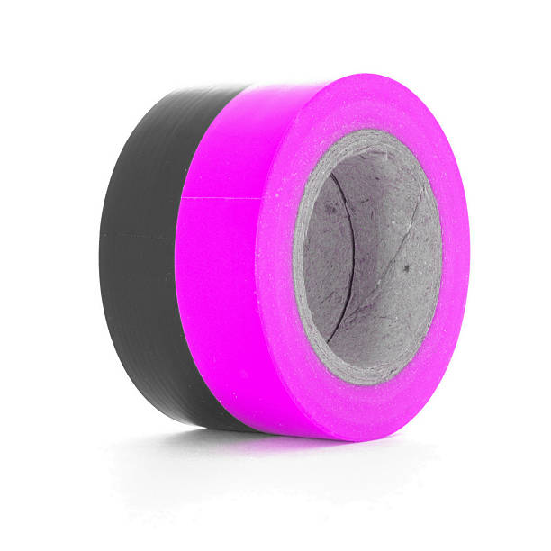 istock Protecting black, pink insulation tape rolls isolated on white background 531263600