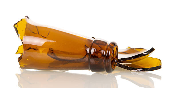 istock The neck  the broken glass bottles isolated on white background 531264626