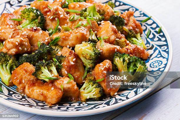 Sesame Chicken And Broccoli Stock Photo - Download Image Now - Backgrounds, Baked, Brown