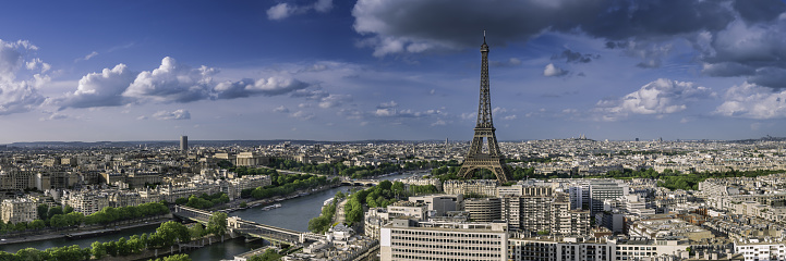 Cityscape of Paris with Eiffel Tower on cloudy day