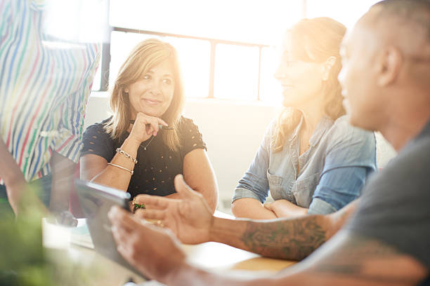 istock Unposed group of creative business people in an open concept 531265792