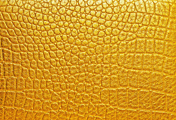istock Gold crocodile leather, can use as background 531266447