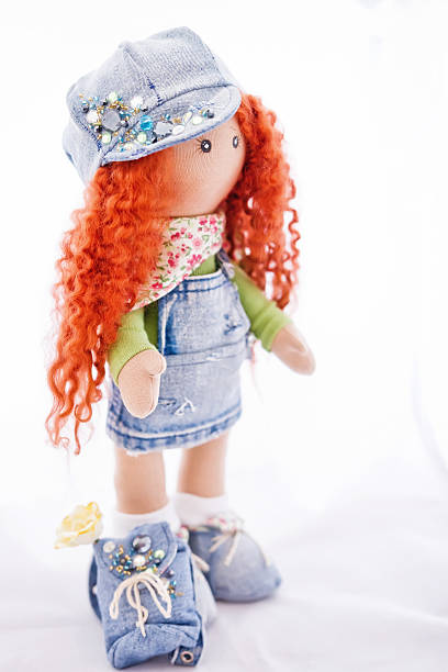 istock Red-haired doll handmade dressed in jeans 531267454