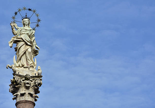 Beautiful statue of Virgin Mary crush dragon and crescent in the historic center of Lucca, made by the artist Giovanni Lazzoni in 1687