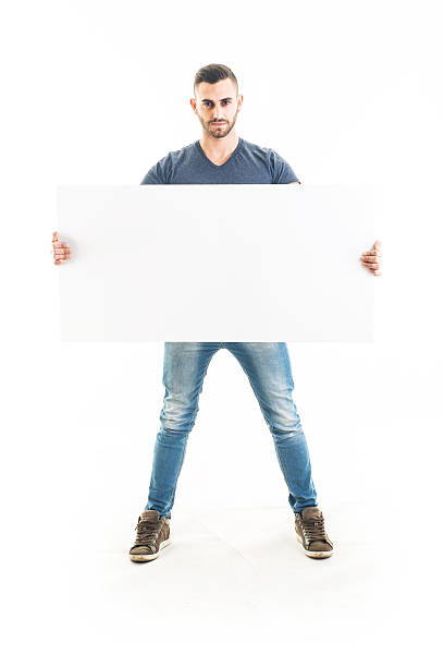 istock Bearded Man Holding a Blank Sign 531268051